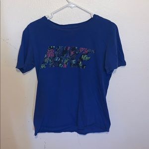 Blue Nike floral shirt